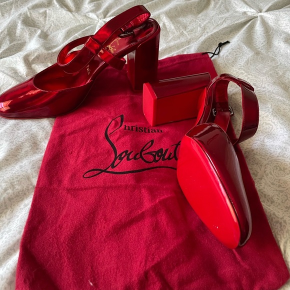 Christian Loubutin Shoes never use.Color red for woman’s. Red button.Exclusives - Picture 6 of 6